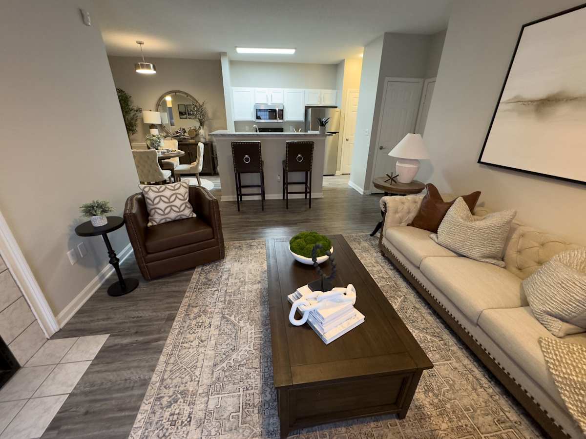 Enclave at Wolfchase living room with sofa and coffee table - Memphis, TN