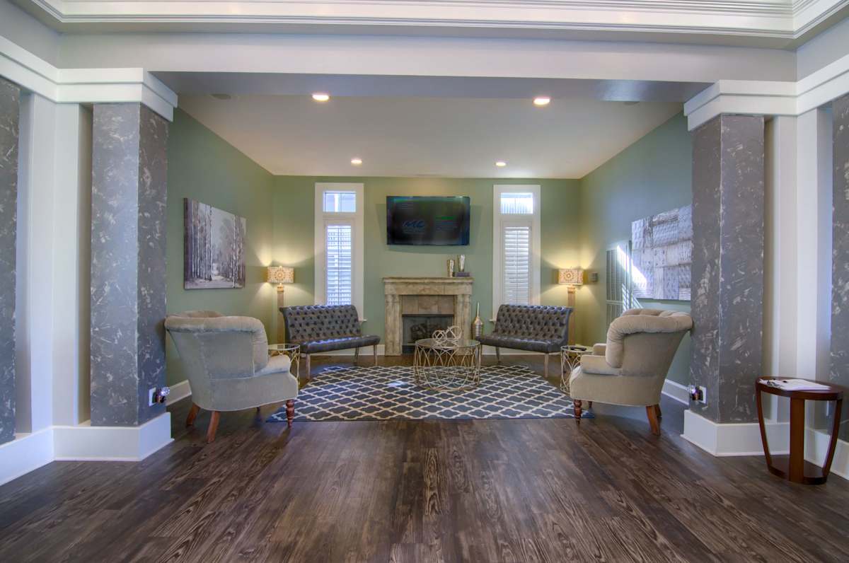 Enclave at Wolfchase lounge with fireplace and seating area - Memphis, TN